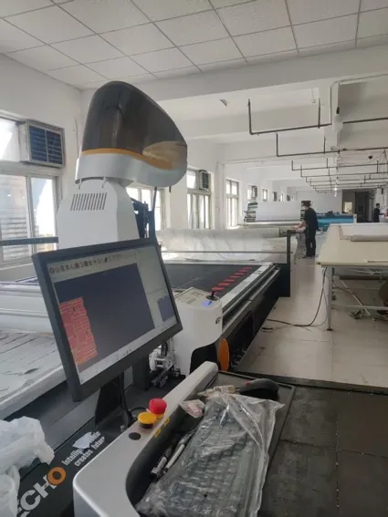 Fabric cutting table — precision cutting for corporate uniforms