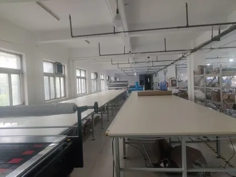 Automated fabric cutting machine — elomos uniform production